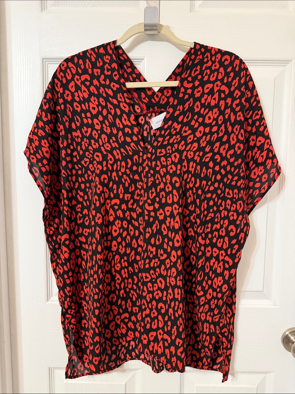 Adrienne Black Top with Red Leopard Spots